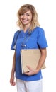 Laughing nurse with blond hair and file Royalty Free Stock Photo