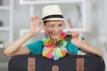 Laughing playful young woman going on holidays Royalty Free Stock Photo