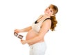 Laughing pregnant woman holding echo in hands Royalty Free Stock Photo