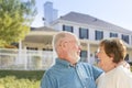 Laughing Senior Couple in Front Yard of House Royalty Free Stock Photo