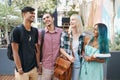 Laughing students, bonding or study break on college campus for group learning, gen z and fun. Happy, young people and Royalty Free Stock Photo