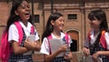 Laughing Students Wearing School Uniforms