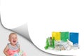 Laughing toddler girl and sorted waste concept