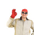 Laughing welder showing okay sign. Royalty Free Stock Photo