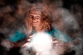 Laughing Witch with light sphere Royalty Free Stock Photo
