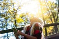 Laughing woman backlit by the warm glow of the sun Royalty Free Stock Photo