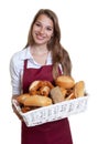 Laughing woman with bread rolls from the bakery Royalty Free Stock Photo