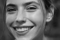 Laughing woman closeup. Portrait of happy smiling girl. Cheerful young beautiful girl smiling laughing outdoor. Royalty Free Stock Photo