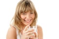 Laughing woman with glass of milk Royalty Free Stock Photo