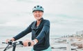 Laughing woman, helmet or electrical bike by sea in transport, clean energy fitness or sustainability travel. Ebike Royalty Free Stock Photo
