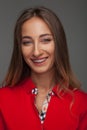 Laughing woman in red polo shirt Royalty Free Stock Photo