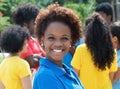 Laughing young african american woman with group of friends Royalty Free Stock Photo