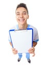 Laughing young doctor showing empty clipboard