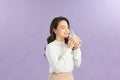 Laughing young woman with a glass of milk Royalty Free Stock Photo