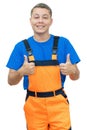 Laughing young worker with orange protective gear Royalty Free Stock Photo