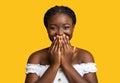 Laughter. Cheerful Black Lady Covering Mouth With Hands In Happy Excitement