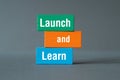 Launch and Learn - word concept on building blocks, text Royalty Free Stock Photo