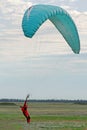 Launch of a paraglider into the sky with a preliminary check on the ground in Volgograd Royalty Free Stock Photo