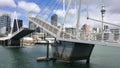 Launch sail through Wynyard Crossing bridge in Auckland