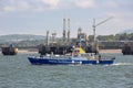 Launch ship sailing near offshore oil terminal near Edinburgh, Scotland