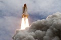 The launch of the space shuttle against the sky, fire and smoke. Elements of this image were furnished by NASA