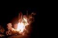 The launch of the space shuttle against the sky, fire and smoke. Elements of this image were furnished by NASA Royalty Free Stock Photo