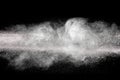 Launched white particle splash on black background. Royalty Free Stock Photo