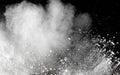 Launched white powder splash on black background. Royalty Free Stock Photo