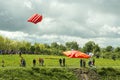 Launching a huge kite into the sky during the annual festival `Motley Sky` in the park `Tsaritsyno` in Moscow,