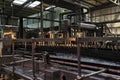 LAUNDA/ANGOLA - 23 MAY 2018 -Soda factory, full bottles to roll in line with sunset light.