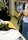 Laundromat folding clothes