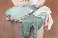 Laundry basket with baby clothes indoors, closeup Royalty Free Stock Photo