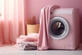 Laundry basket on blurred background of modern washing machine in contemporary home interior setting Royalty Free Stock Photo