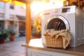 Laundry basket on blurred background of modern washing machine in home interior setting Royalty Free Stock Photo