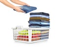 Laundry basket with folded clothes Royalty Free Stock Photo