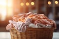 Laundry basket full of clothes next to a contemporary washing machine in a chic laundry room setting Royalty Free Stock Photo