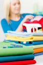 Laundry clothespin - woman folding clothes Royalty Free Stock Photo