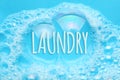 Laundry concept. Soap suds foam and bubbles from detergent