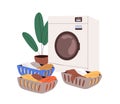 Laundry concept. Washing machine and dirty clothes in baskets. Washer equipment and sorted linen in containers