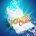Laundry detergent with close up that cleans dirt in clothing, light blue background