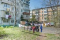 Laundry dries on the rope in courtyard of Khrushchyovka, a common type of old low-cost apartment building in Russia and post-