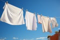 Laundry flutters on the line, air drying under the suns warmth