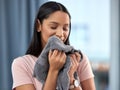 Laundry, fresh linen and woman smelling towel after spring cleaning, housework and washing clothes in the morning Royalty Free Stock Photo