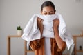 Laundry, fresh and woman smelling a towel after cleaning, housework and washing clothes in the morning. Chores Royalty Free Stock Photo