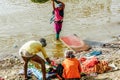 Laundry on Ganges river, India