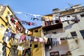 Laundry hanging on a clothes line on an old building Royalty Free Stock Photo