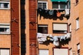 Laundry hanging on clothing rope from the building in Madrid, Spain Royalty Free Stock Photo