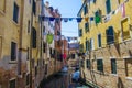 Laundry hanging out of a typical Venetian facade, Italy