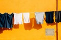 Laundry hanging on rope in Burano island, Venice, Italy Royalty Free Stock Photo