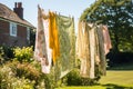 Laundry, housekeeping and homemaking, fresh clean clothes and linen drying outdoors in the garden, country cottage style, Royalty Free Stock Photo